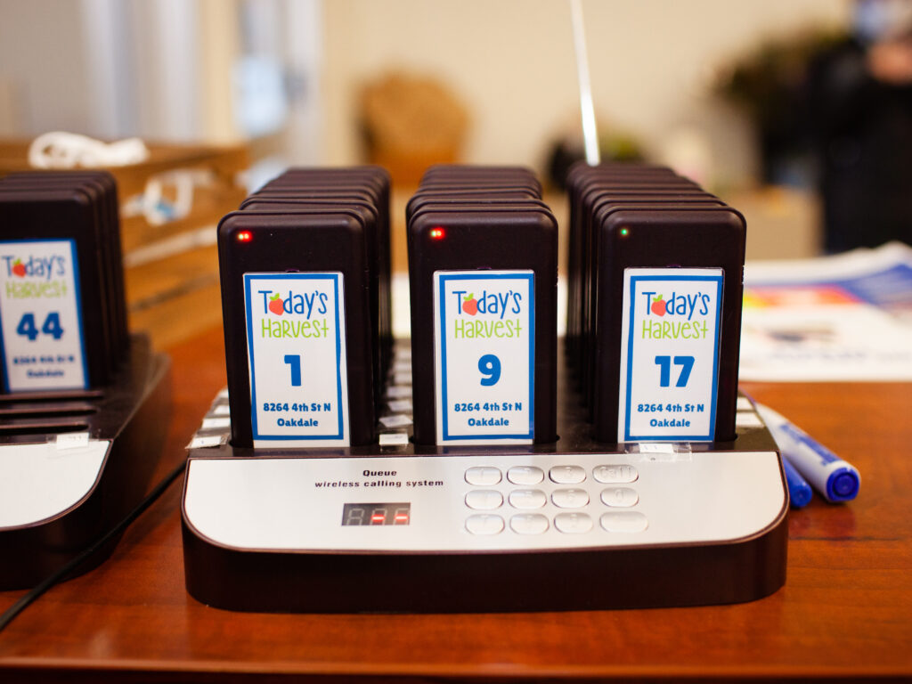 Pagers labeled with numbers and the Today's Harvest logo.